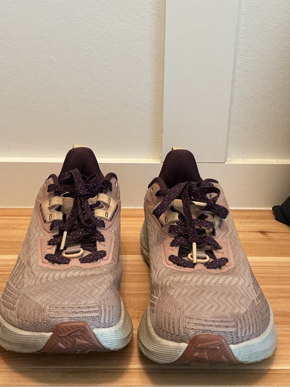 Altra women's sneakers in blush pink with deep plum accents